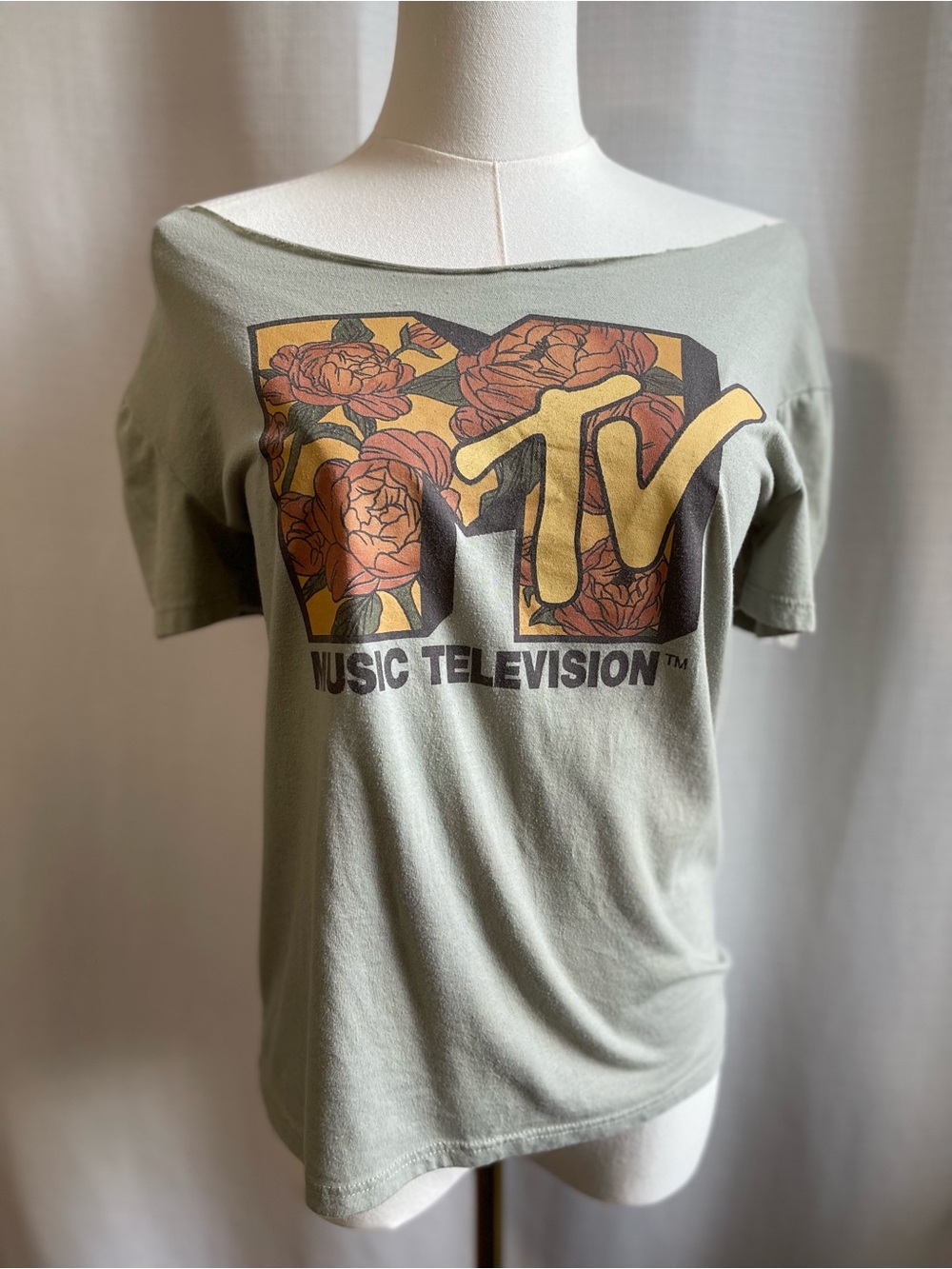 MTV Graphic Floral Tee in Sage Green with Warm Floral Accents